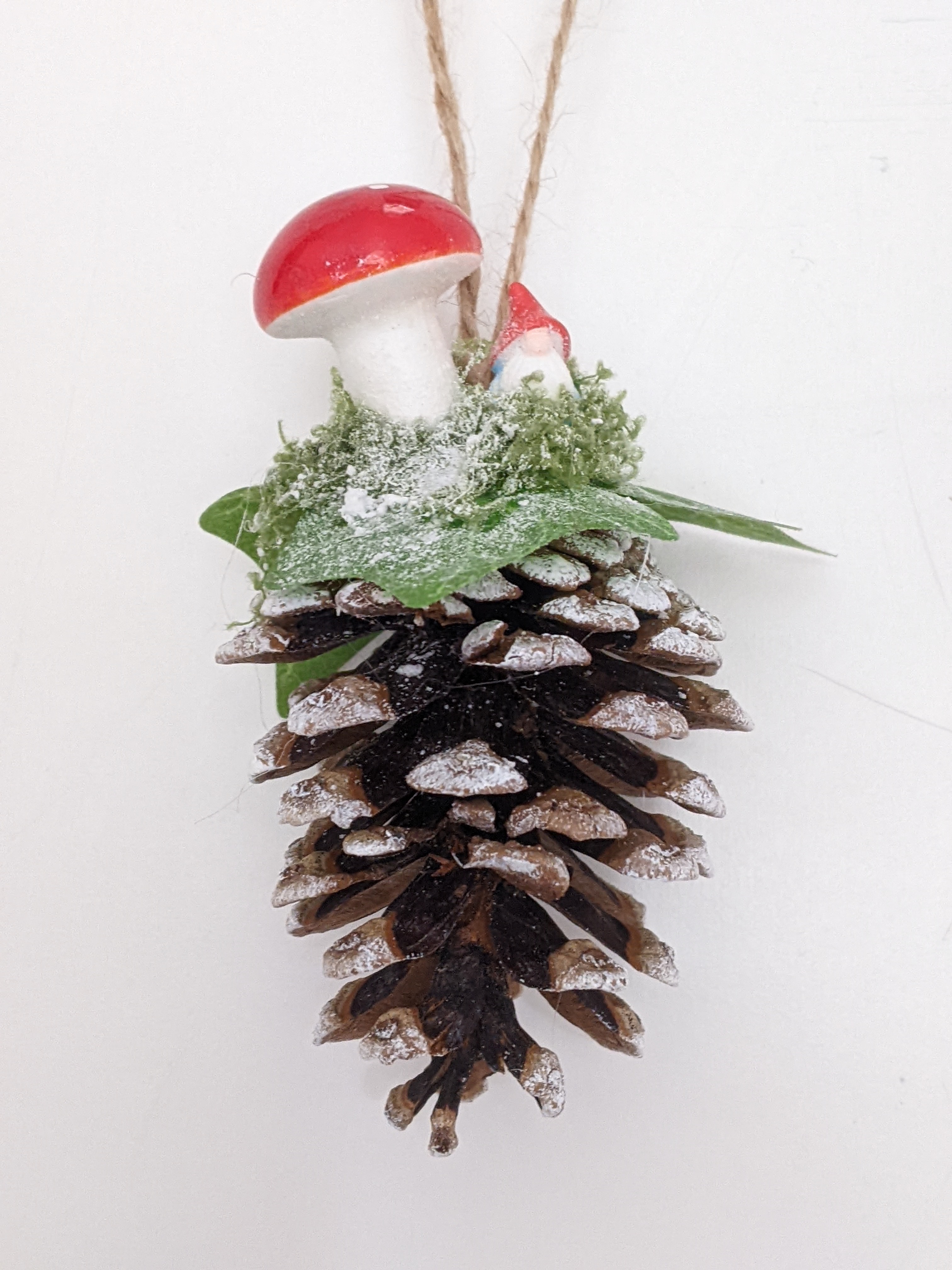 Gnome on a Fir Cone Christmas Decoration..