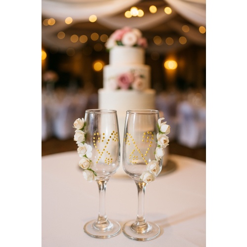 Union: Champagne Glasses Adorned with White Flowers & Golden Symbols